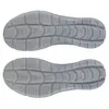 The image shows the soles of two white safety shoes against a white background. Produktbild-Vorschau