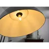 Close-up view of the inside of a lamp shade with a light bulb. Anteprima dell’immagine prodotto