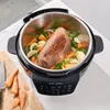 A roast and vegetables are being cooked in an Instant Pot on a kitchen counter. Anteprima dell’immagine prodotto
