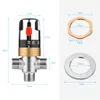 A diagram showing a thermostatic mixing valve with dimensions and two circular metal components. Náhled obrázku produktu