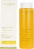 A product shot of a Clarins bath and shower concentrate bottle and its packaging. Anteprima dell’immagine prodotto