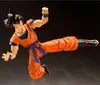 An action figure of Son Goku in a dynamic kicking pose against a dark background. Produktbild-Vorschau