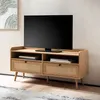 A television stand with a television on top, in a room setting. Produktbild-Vorschau