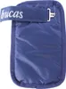 A close-up view of a navy blue horse blanket extender with a magnetic T-bar closure and a strap with the brand name 'Bucas' embroidered on it. Anteprima dell’immagine prodotto