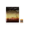 A package of Illy Hordeum Orzo coffee capsules and one loose capsule. Produktbild-Vorschau