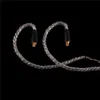 A close-up shot of two headphone cables with MMCX connectors against a black background. Podgląd zdjęcia produktu