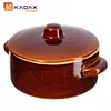 A brown ceramic pot with a lid, isolated on a white background. Produktbild-Vorschau