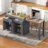 A kitchen island cart with an extendable countertop, set up in a kitchen environment with chairs and kitchen appliances in the background. Voir les images du produit
