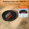 A robotic vacuum cleaner on a carpet with a close-up of its brush and dust. An inset shows the vacuum cleaning and lifting dirt. Náhľad obrázku produktu