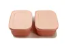 Two pink food storage containers with lids are shown side-by-side on a white background. Produktbild-Vorschau