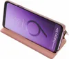 A gold Samsung Galaxy S9 Plus phone in a book-style case, displayed at an angle on a white background. The phone screen is on and displays the time and date. Náhľad obrázku produktu