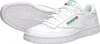 A pair of white Reebok Club 85 sneakers shown from a diagonal angle on a white background. Voir les images du produit