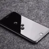 A close-up shot of a smartphone screen with water droplets on it, placed on a textured gray surface. Anteprima dell’immagine prodotto