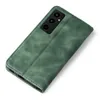 A green flip cover for a smartphone is shown against a white background. Produktbild-Vorschau