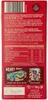 The back of a chocolate bar wrapper with nutritional information, ingredients, and marketing text. Produktbild-Vorschau