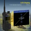 A walkie-talkie is shown with a close-up of its LCD screen displaying brightness settings. Produktbild-Vorschau