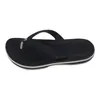 A single black Crocs flip-flop is shown against a white background. Produktbild-Vorschau