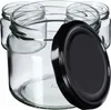 Several empty glass jars are arranged with one black lid in the foreground. Produktbild-Vorschau