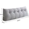 A gray triangular cushion with buttons, placed on a white background with size indicators. Produktbild-Vorschau