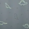 A pattern of dinosaurs and stars on a gray background. Náhľad obrázku produktu