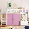 A child's loft bed with storage and a playhouse-like facade, decorated with children's artwork and toys. Produktbild-Vorschau