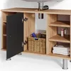 A close-up view of a bathroom vanity cabinet with an open door, showing storage compartments and items. Náhled obrázku produktu