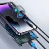 A car charger is plugged into a car's power outlet and is charging two smartphones. Produktbild-Vorschau