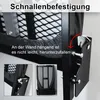 Close-up of a wall-mounted ironing board bracket and a folded ironing board. Produktbild-Vorschau