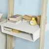 A white shelf unit with books and a yellow alarm clock on it, attached to a wooden frame, against a light blue wall. Podgląd zdjęcia produktu