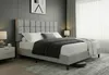 A bedroom scene featuring a bed with bedding, a nightstand, and a lamp. Produktbild-Vorschau