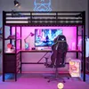 A gaming loft bed setup with a desk, chair, and computer. Náhled obrázku produktu