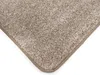 A close-up view of the corner of a beige carpet with a brown border. Produktbild-Vorschau