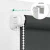Close-up of a roller blind mechanism and fabric, with an inset showing a measurement detail. Náhled obrázku produktu
