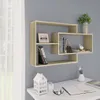 A light oak wood floating shelf unit is mounted on a gray wall above a white desk. Produktbild-Vorschau