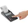 A hand is pressing a button on a black Casio printing calculator with a receipt paper coming out. Voir les images du produit