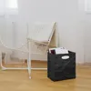 Knitterbox mit Magazinen, dekorativ platziert neben einem Wartezimmerstuhl Produktbild-Vorschau