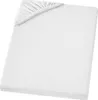 A white fitted sheet is shown from a slightly elevated angle, with the elasticized corner visible. Produktbild-Vorschau
