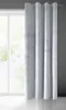 A light gray curtain hangs on a curtain rod in front of a window. Náhľad obrázku produktu