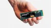 A hand holding a computer component. Podgląd zdjęcia produktu