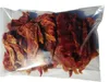 A clear, well-lit product shot of dried meat treats for dogs, packaged in a transparent plastic bag. Produktbild-Vorschau