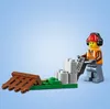 A LEGO minifigure construction worker operating a jackhammer on a small construction site. Náhľad obrázku produktu