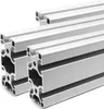 Several pieces of aluminum extrusion profiles are arranged in a close-up shot against a white background. Anteprima dell’immagine prodotto
