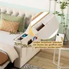 A close-up view of a bed with integrated storage compartments in the armrest, showing dimensions and features. Anteprima dell’immagine prodotto