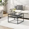 A modern living room scene with a couch, coffee table, and rug. Produktbild-Vorschau