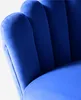 A close-up view of the back of a blue velvet armchair. Produktbild-Vorschau