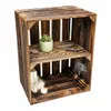 A wooden crate with two shelves, decorated with a plant, a stone, dried lavender, a feather, and two small gift boxes with a candle. Náhled obrázku produktu