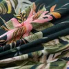 A close-up of a floral patterned fabric. Náhľad obrázku produktu
