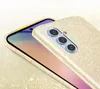 Close-up of a gold glitter phone case on a phone. Produktbild-Vorschau