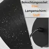 A close-up of a black lampshade with a starry pattern and a detail of the lamp's base and wiring, alongside text describing the materials. Anteprima dell’immagine prodotto