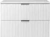 A front view of a white, two-drawer cabinet with vertical ribbed detailing on the drawer fronts and black handles. Náhled obrázku produktu